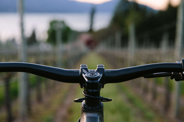 ST1 31.8 - Title MTB 31mm mountain bike stem shown on mountain bike from riders perspective 